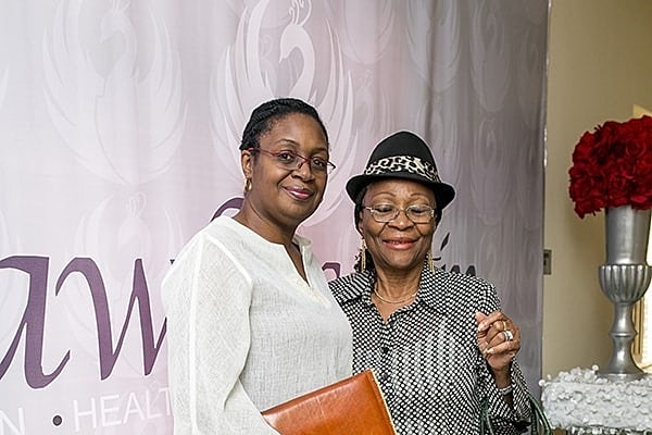 Two women posing at an event.