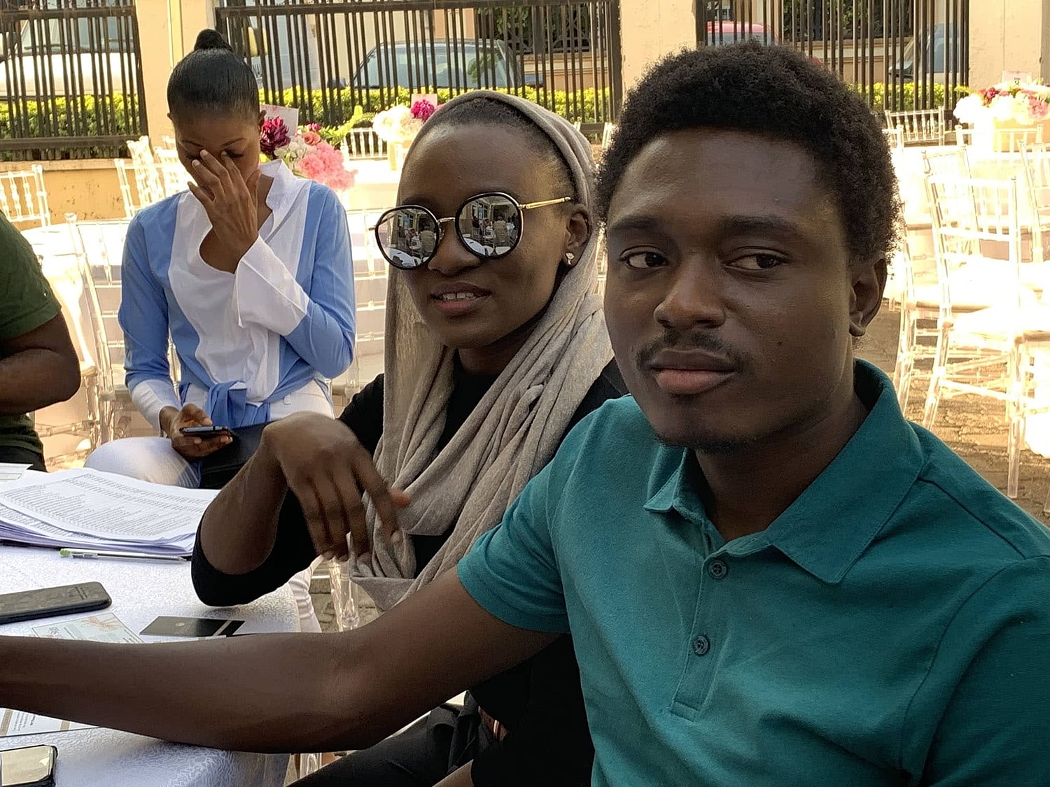 Group of friends at outdoor social event.