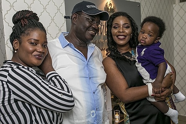 Family portrait with happy expressions and smiles.