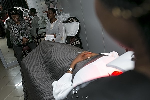 Women engaged in conversation in a relaxing setting.