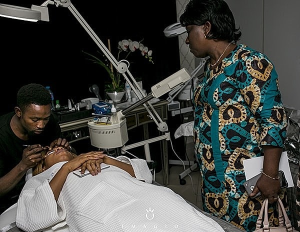 Client receiving a beauty treatment in a salon.