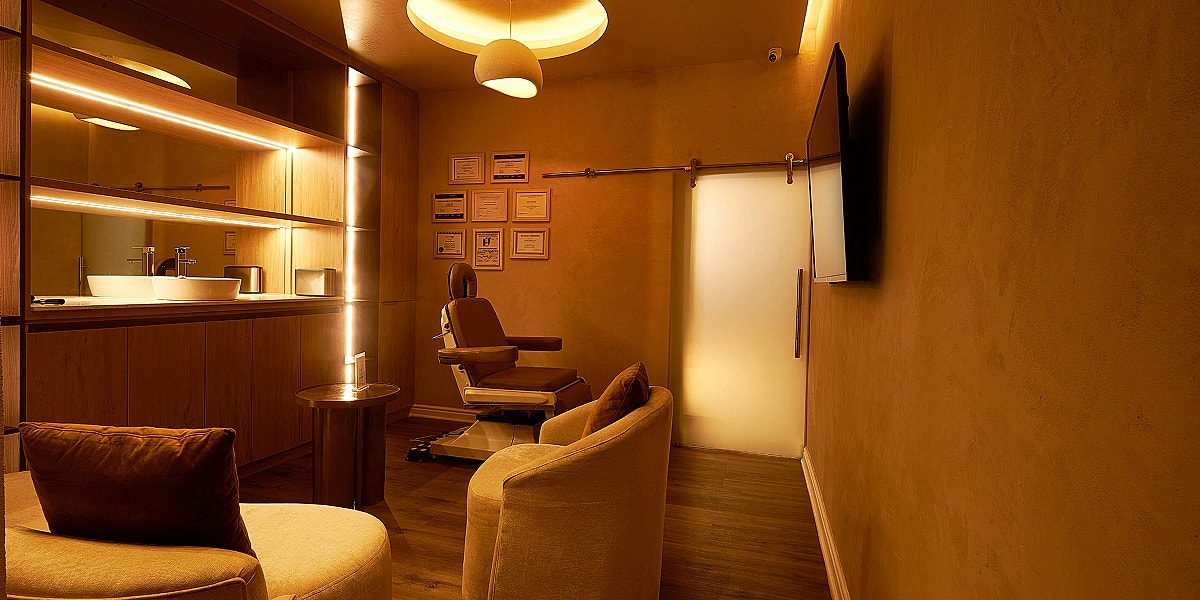 Cozy interior of a modern spa treatment room.