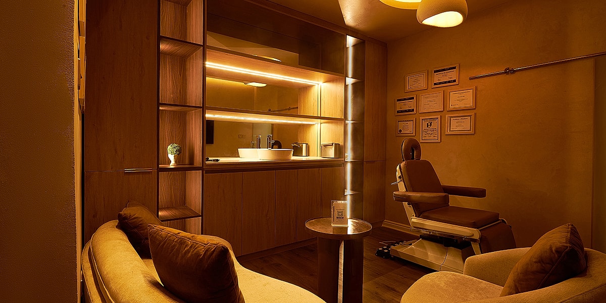 Modern spa room with warm lighting and decor.