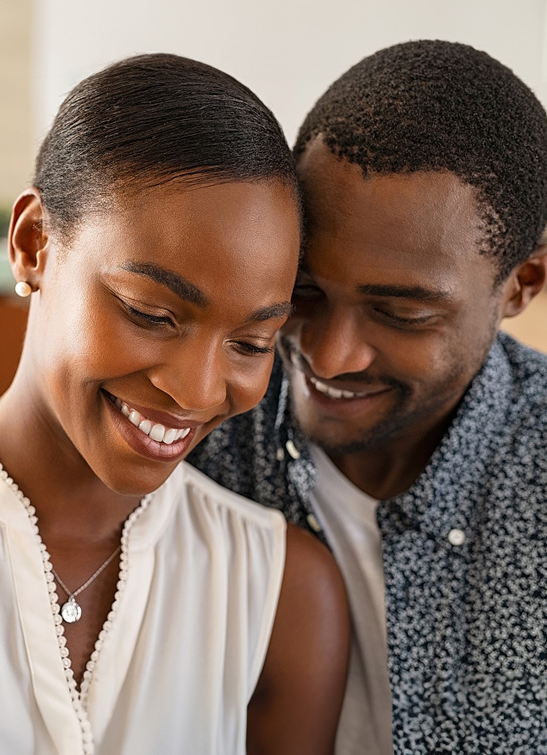 Happy couple sharing a joyful moment together.