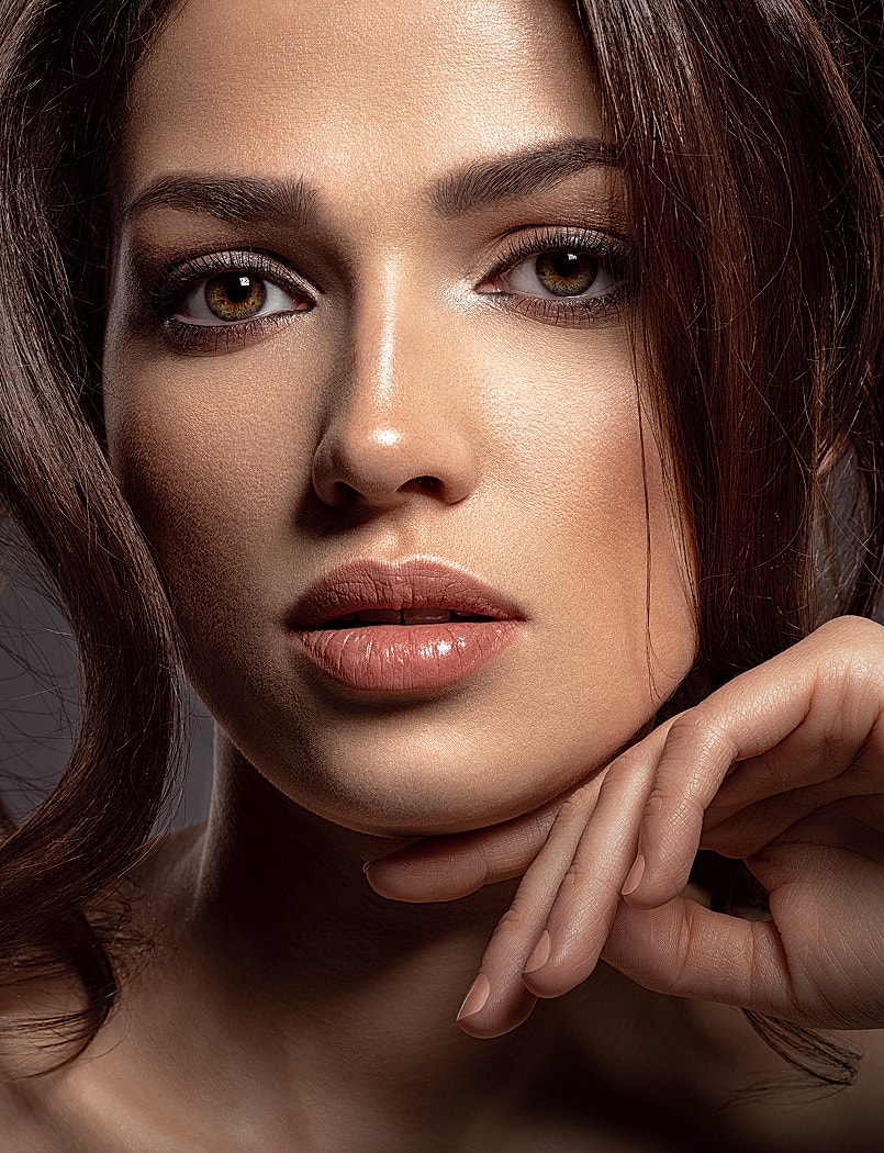 Close-up of a woman with soft features.