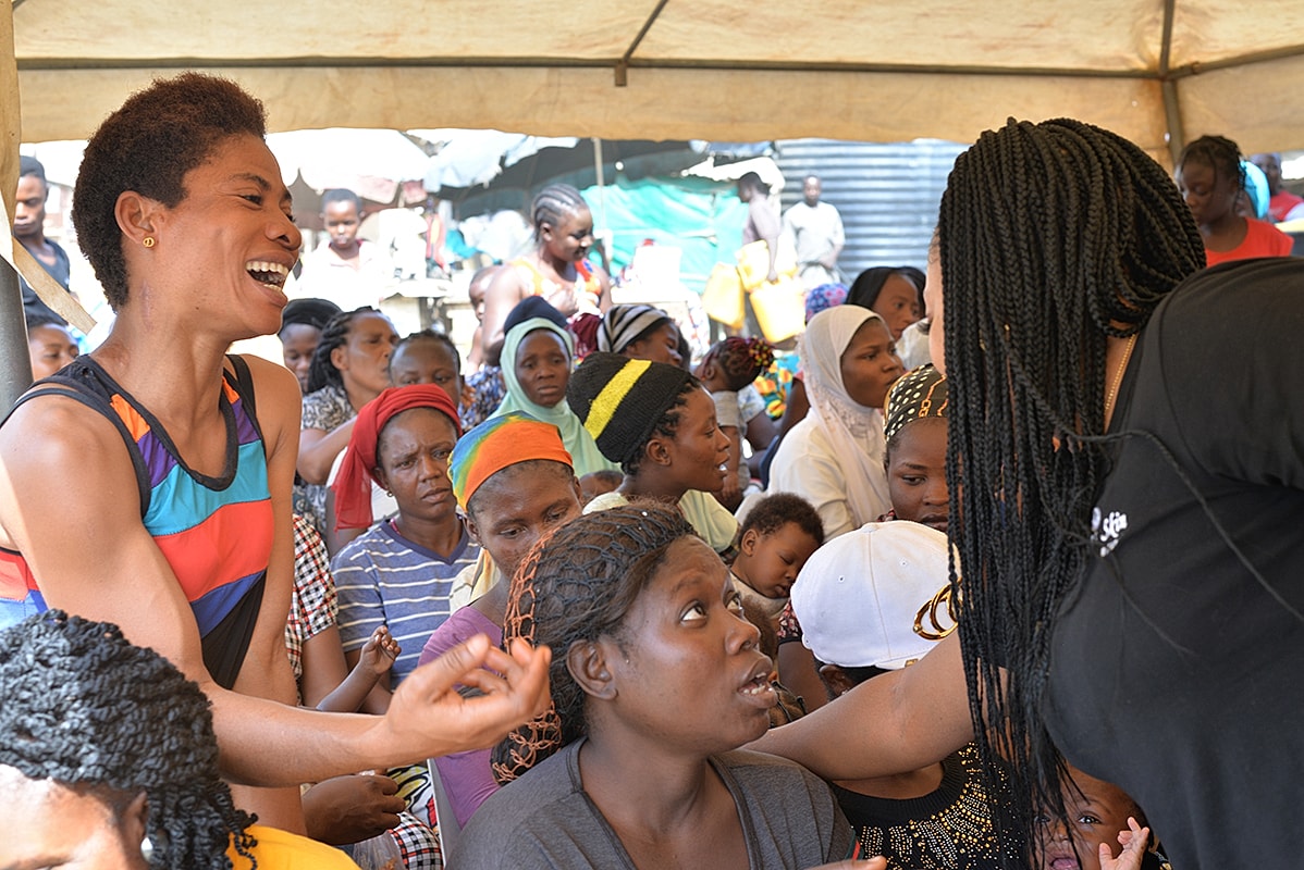Women engaged in lively community discussion.