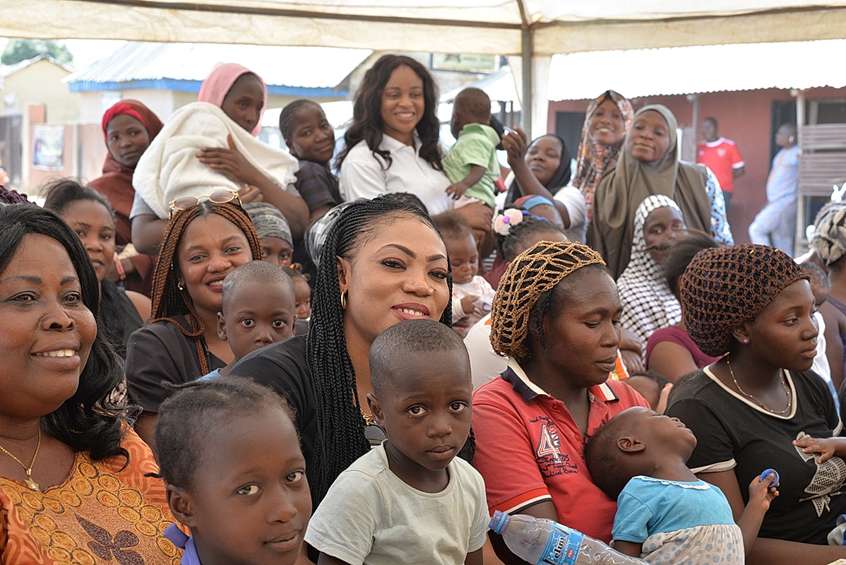 Women and children at a community gathering.