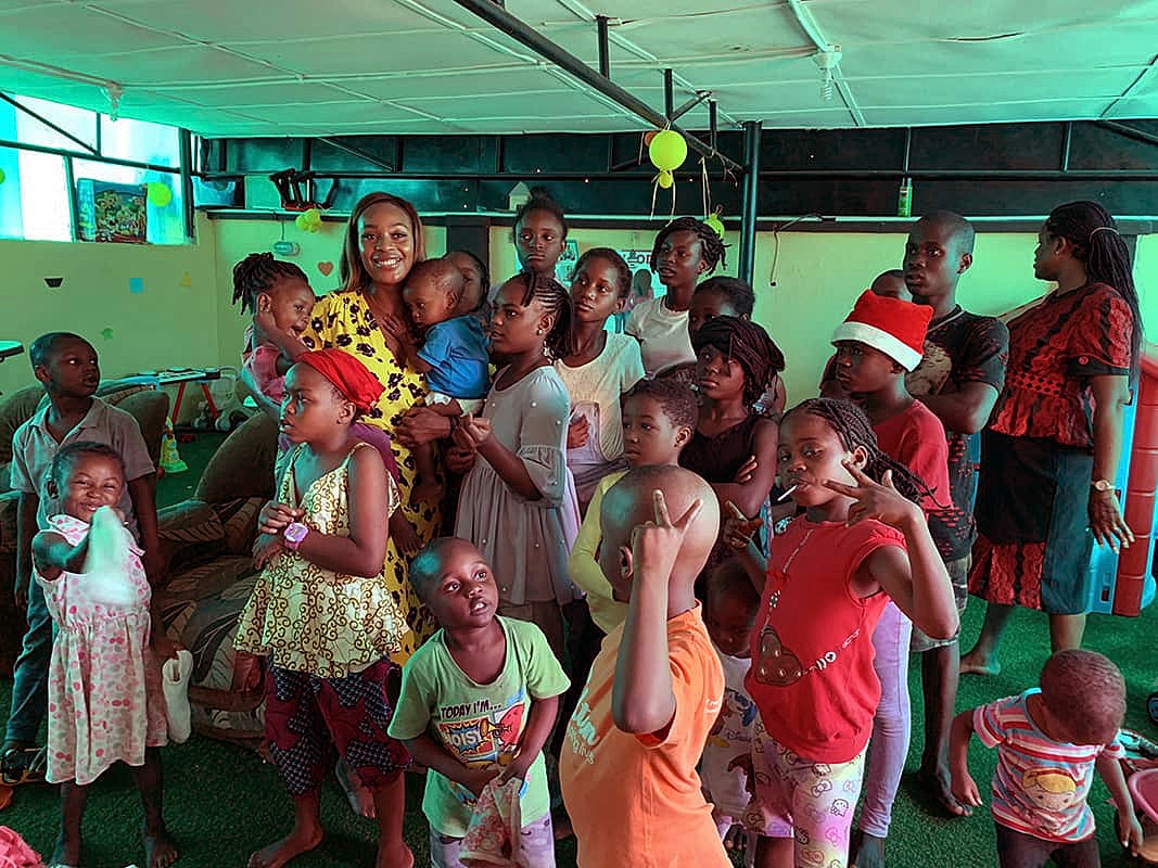 Children's gathering in a vibrant indoor space.