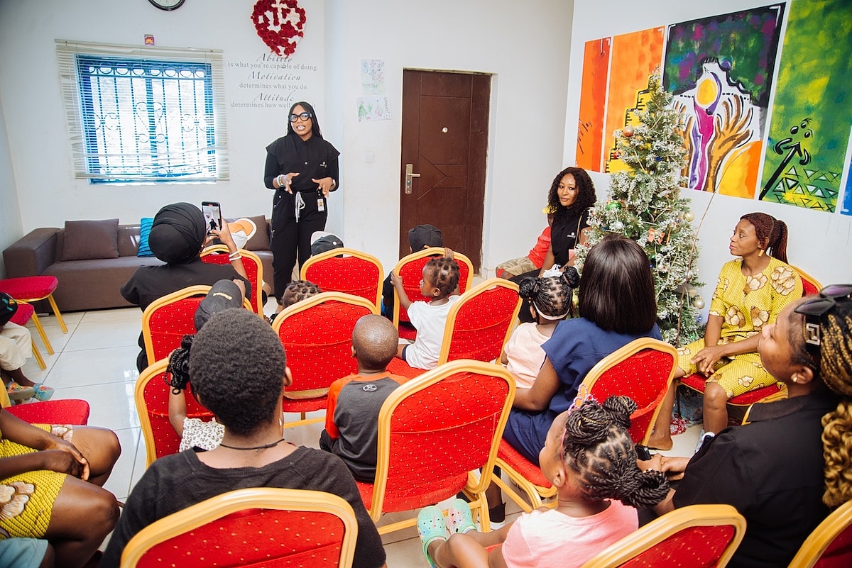 Group discussion in a colorful community space.