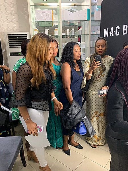 Group of women at a beauty event.