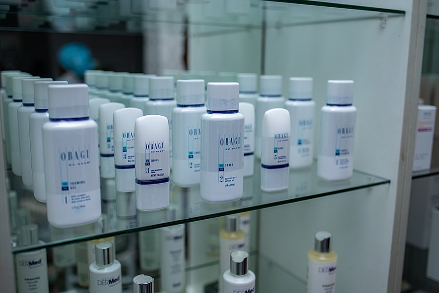 Obagi skincare products arranged on a shelf.