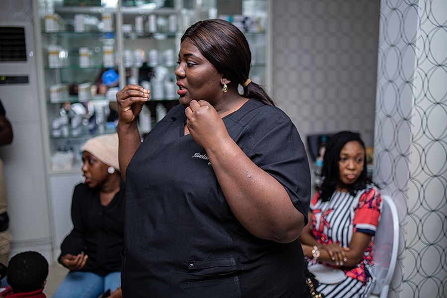 Woman speaking passionately to an engaged audience.