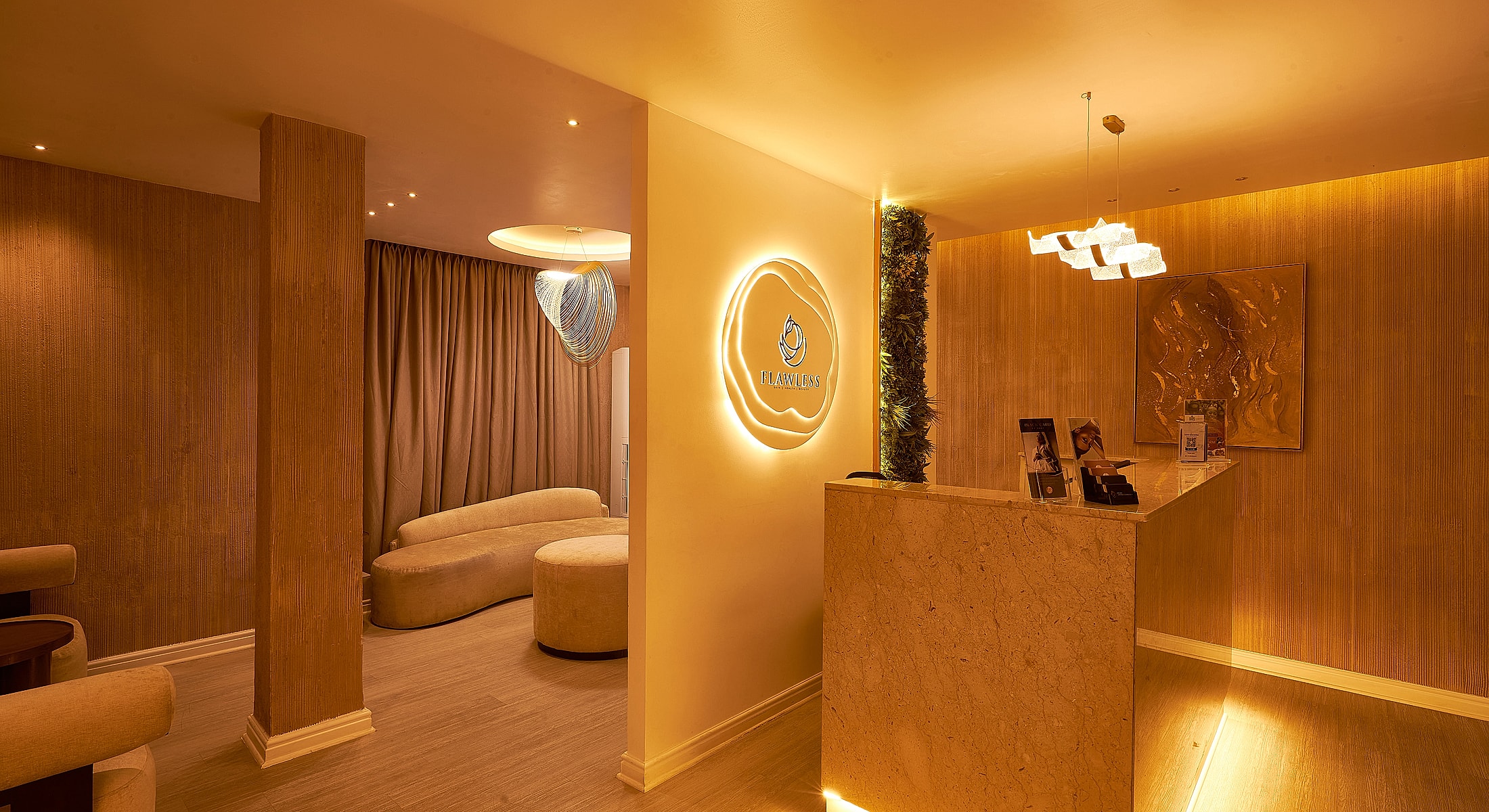 Modern spa reception with warm lighting and decor.
