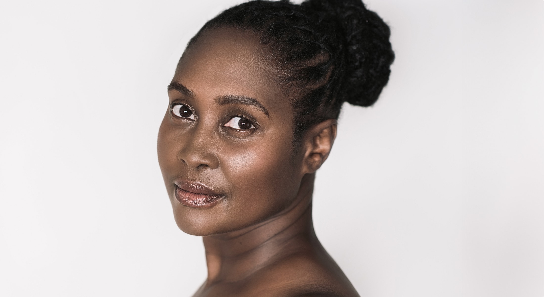 Portrait of a woman with natural hair.